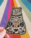 Sticker of a bear with a beer on a colorful striped background